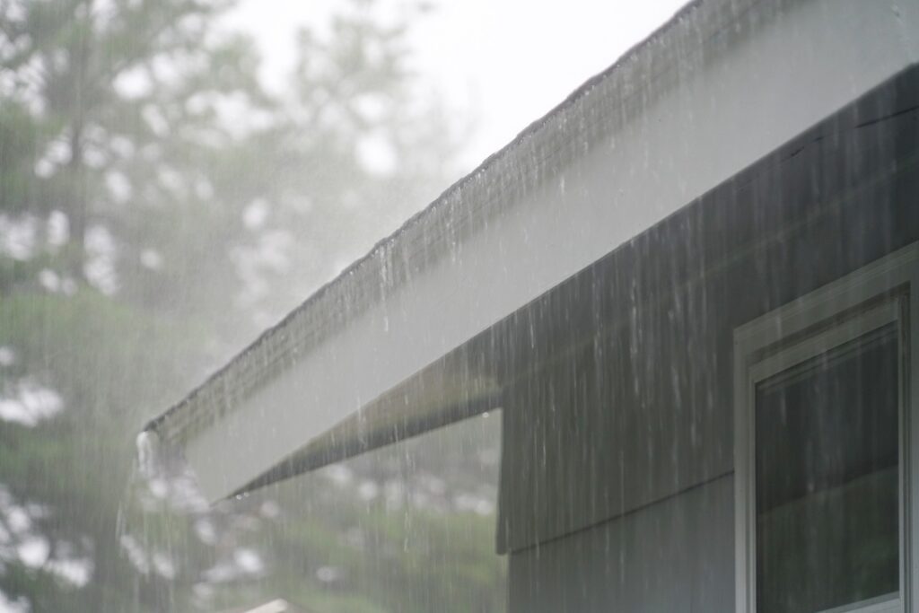 Roof being drenched in storm