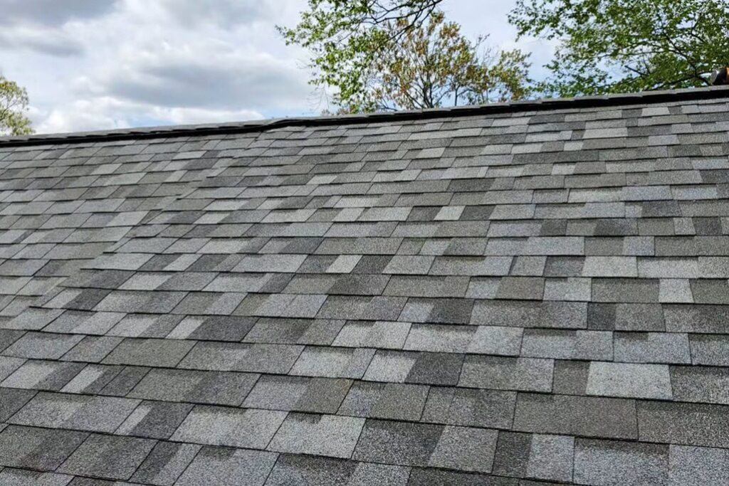 Standard three-tab shingles on residential rooftop