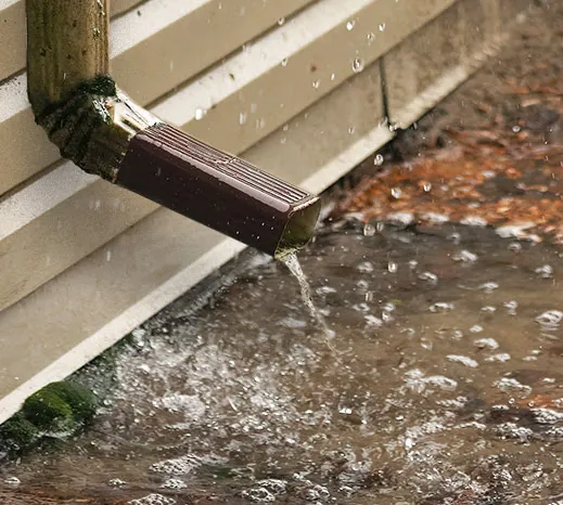 What Happens When Water Collects at the Foundation of Your Building? by Emmit at Tidewater Roofing What Happens When Water Collects at the Foundation of Your Building? Image