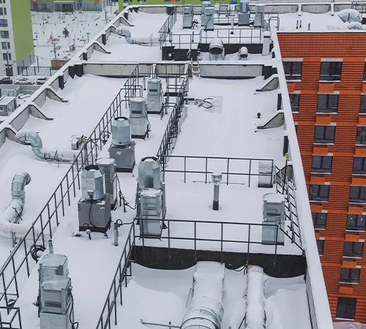 What Happens to Your Commercial Roof When It Snows? by Emmit at Tidewater Roofing What Happens to Your Commercial Roof When It Snows? Image